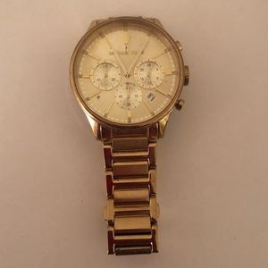 Gold Michael kors round face women’s watch